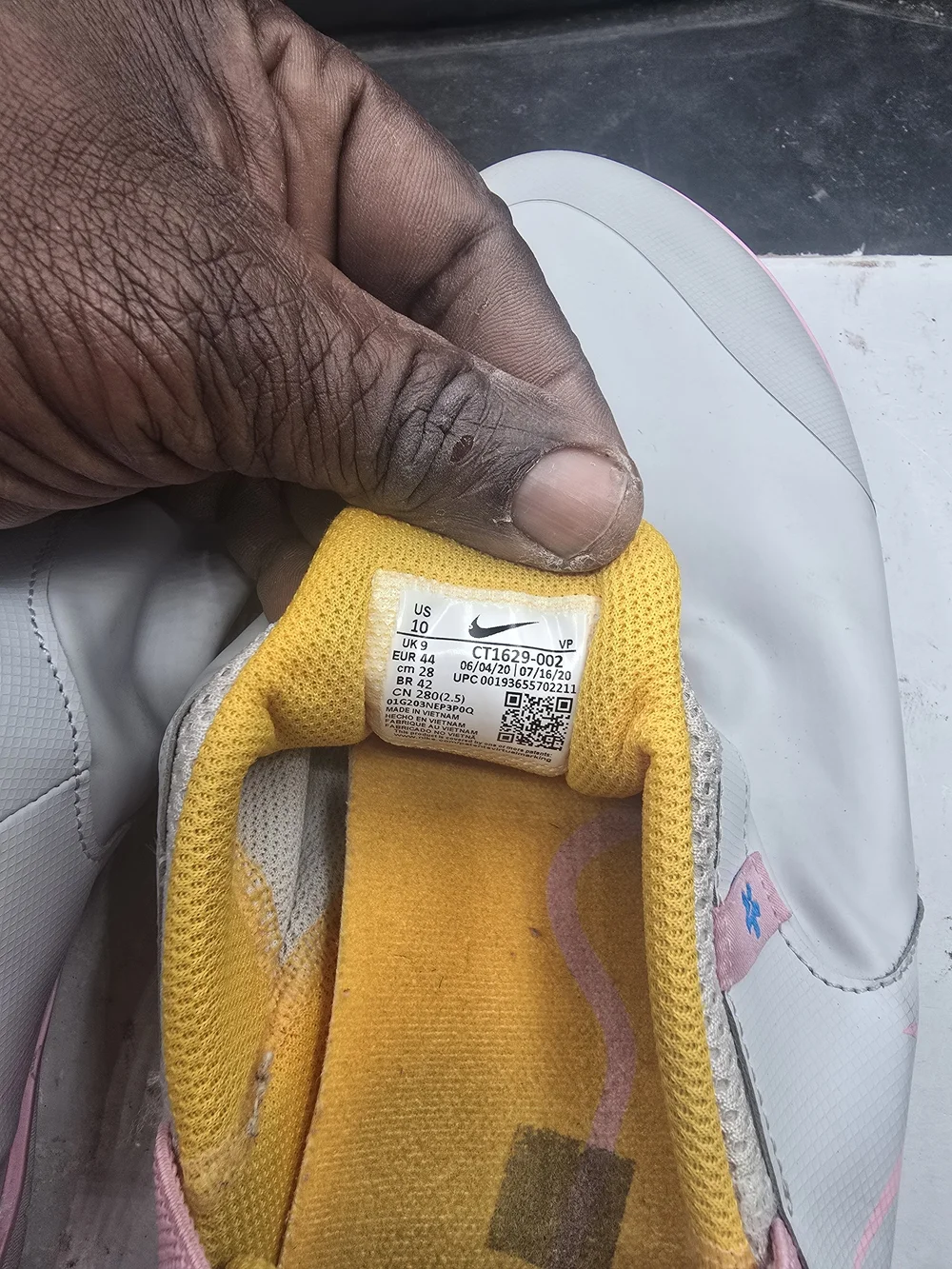 Nike Light Gray Slip-On Sneakers with Pink‎ and Yellow Accents